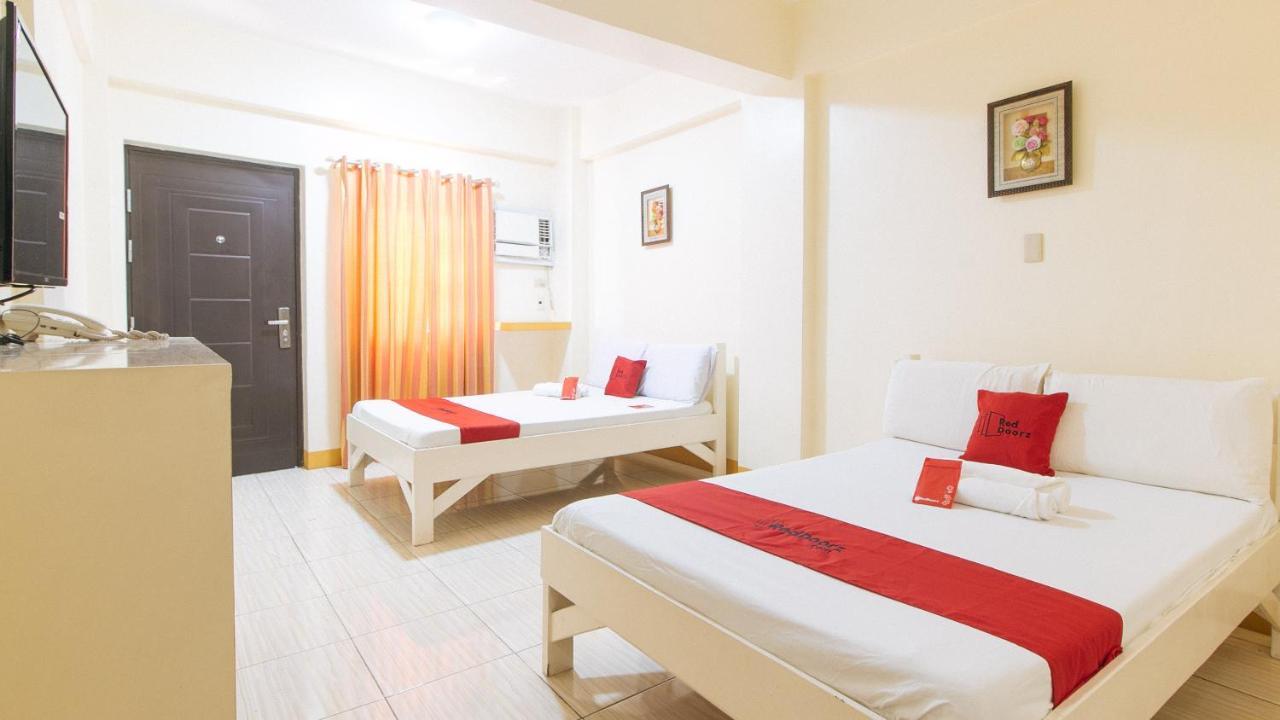 Reddoorz @ Golden Skye Hotel Guagua Bagian luar foto
